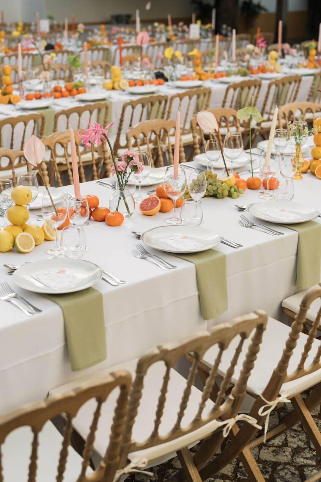 Black and white photo of a women performing modern dance on a dark background.