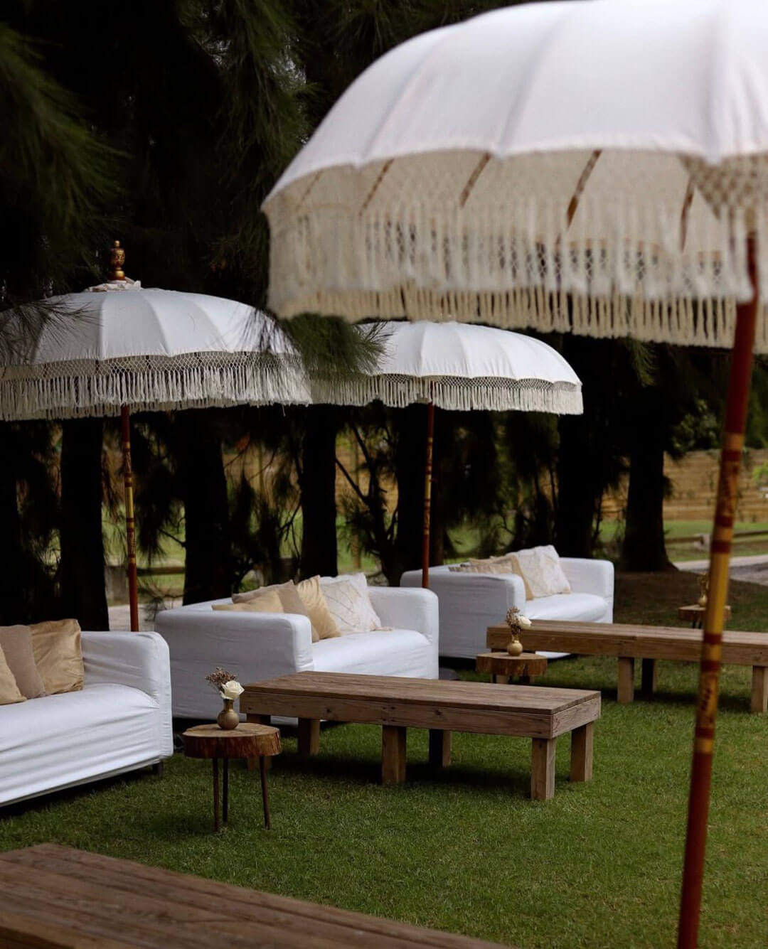 Black and white photo of a women performing modern dance on a dark background.